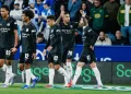 Para pemain Manchester City lakukan selebrasi usai cetak gol ke gawang Huddersfield Town