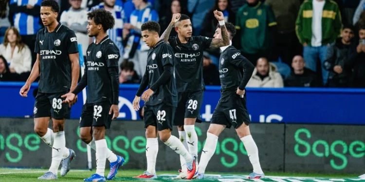 Para pemain Manchester City lakukan selebrasi usai cetak gol ke gawang Huddersfield Town