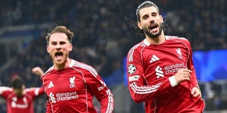 Pemain Liverpool, Dominik Szoboszlai melakukan selebrasi usai bobol gawang Inter Milan